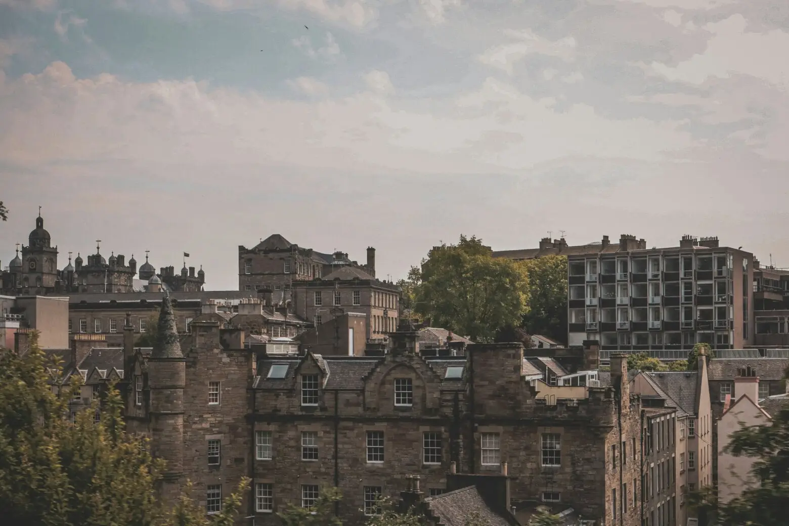 Winter property maintenance Edinburgh - homeowner preparing home heating system before winter frost